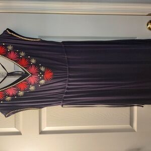 Elegant Navy Dress with Red and Gold Accents